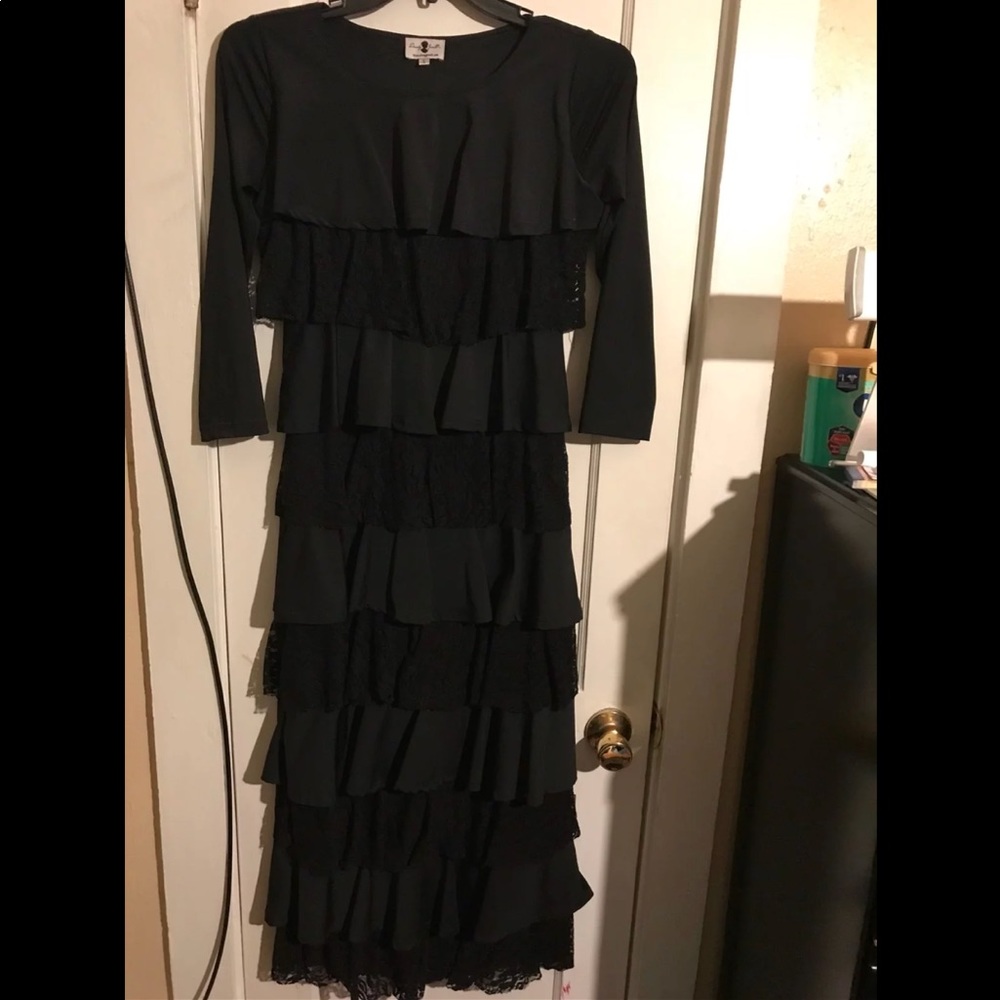 Dainty Jewell’s black ruffle dress